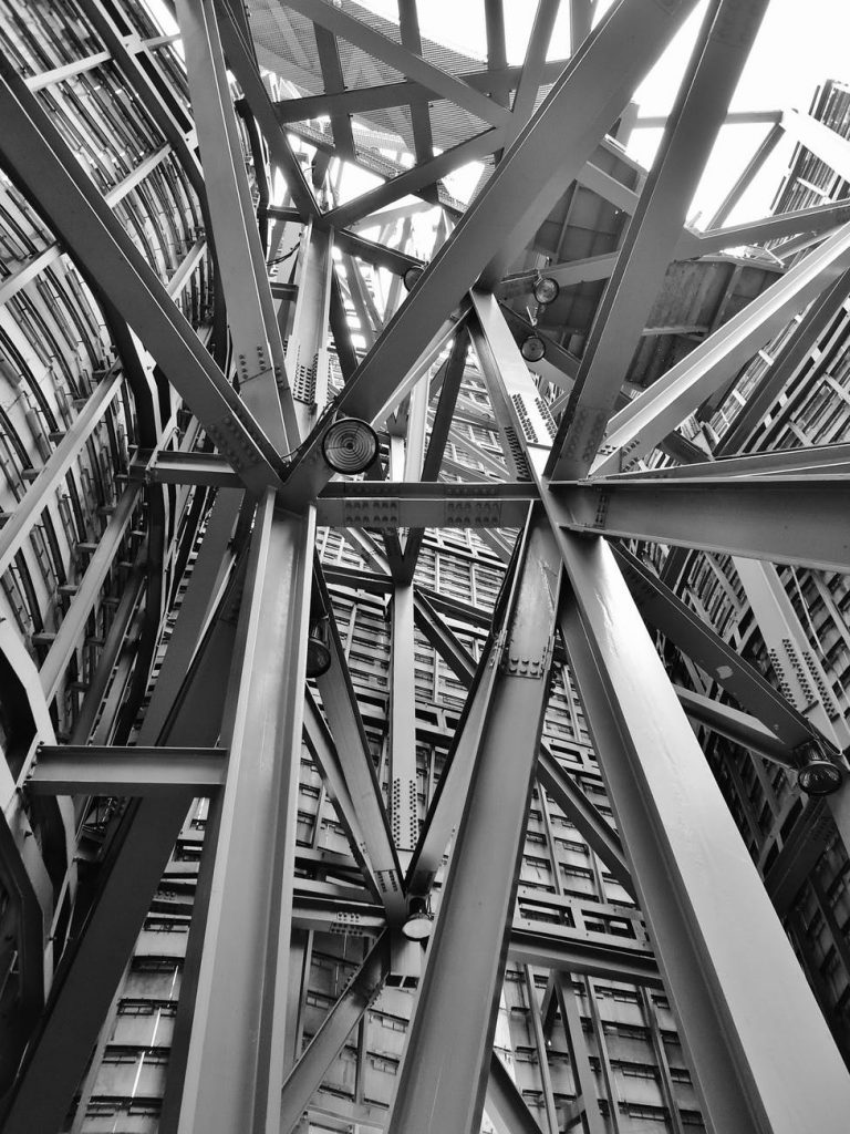 grayscale photography of scafoldings